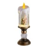 Voltsify decorative Christmas snow globe LED candle lamp with music function for holiday home décor.