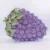 Purple hollow-out diamond evening clutch purse in grape shape with crystal design for weddings and parties.